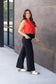 High-waisted black wide leg pants with pockets by Julia Rose, Julia Rose women’s wide leg pants lifestyle image