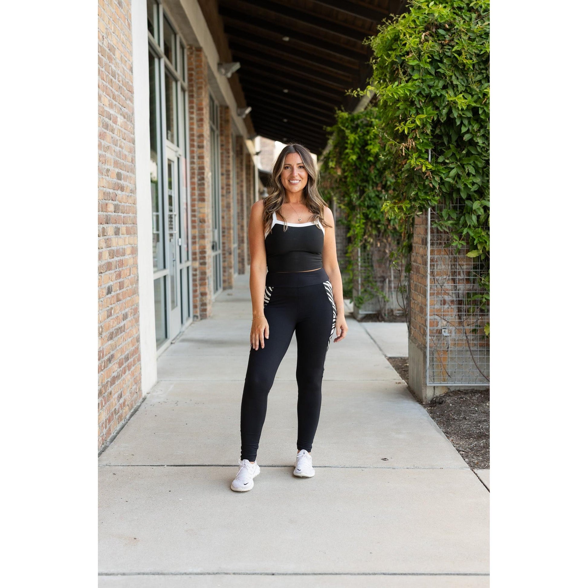 Women’s black leggings with zebra print panels  Stretchy leggings withflattering fit"