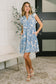 Lizzy Flutter Sleeve Dress in White and Blue Floral